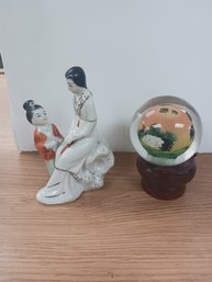 Oriental Figurine And Ball