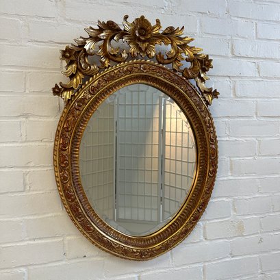 French Rococo Style Oval Giltwood Mirror