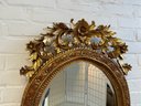 French Rococo Style Oval Giltwood Mirror