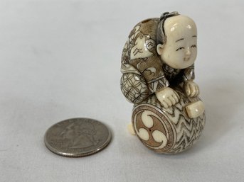 Japanese Carved Netsuke Boy On Drum