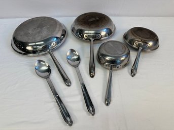 4 All Clad Pans Together With 2 Cooking Utensils