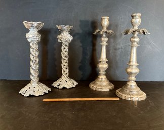 Two Pair Of Highly Decorative Metal Candlesticks