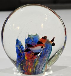 Glass Paperweight - Black, Orange,  White Fish Swimming Through Blue Grass