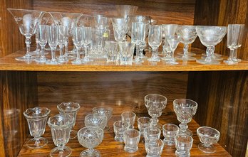 #82 - Two Shelves Of Glasses