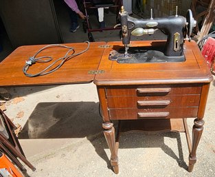 #109 - Early 1900s White Rotary Sewing Machine,  Cabinet And Accessories