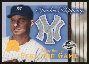 2000 FLEER FEEL THE GAME TOMMY HENRICH RELIC