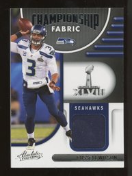 2022 ABSOLUTE FOOTBALL RUSSELL WILSON PLAYER WORN/USED JERSEY PATCH - CHAMPIONSHIP FABRIC