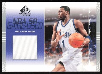 2003-04 SP Game Used  #65 Tracy McGrady  Game Worn Jersey Magic