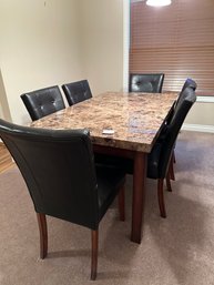 Dining Room Table With Six Black Chairs