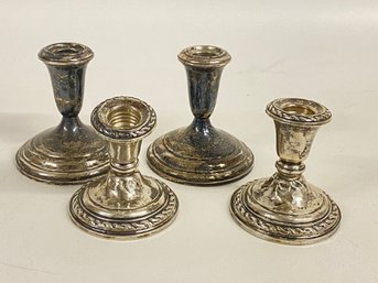 Four Weighted WonkySterling  Silver Candle Stick Holders