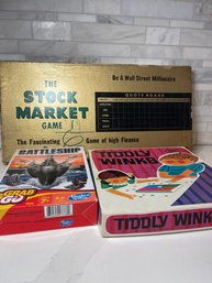 Vintage Board Games!   Tiddly Winks, The Stock Market Game And Battleship!