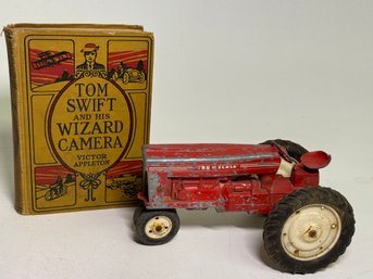 Vintage Metal Tractor And Tom Swift And His Magic Camera By Victor Appleton