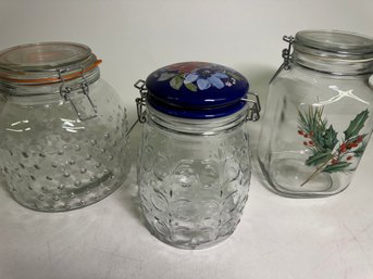 Three Large Decorative Glass Containers