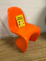 Sweet Swedish Style Child Chair With A Little Charlie Brown Reading Material