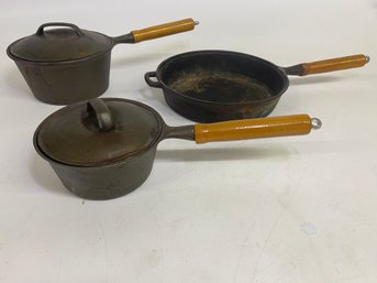 Trio Of Vintage Cast Iron Cookware With Wooden Handles