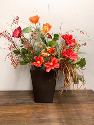 Black Metal Vase With Vibrant Spring Poppies And Other Flowers, Leaves And Grasses.