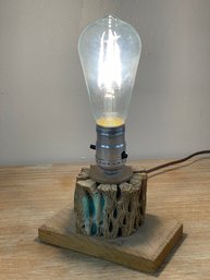 Simple Hand Carved Wood Lamp Base With Large Edison Bulb.