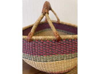 Beautiful African Handmade  Basket With Rolled Leather Straps.