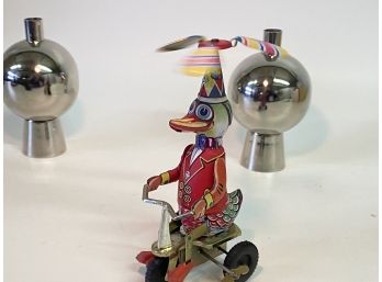 Vintage Tin Toy Whirling Bike Riding Duck And Two Shiny CB2 Vases