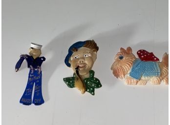 Three Vintage Plastic Pins