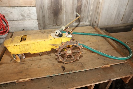 LOT 168 - VERY OLD REALLY COOL LAWN SPRINKLER SHAPE OF A YELLOW TRACTOR