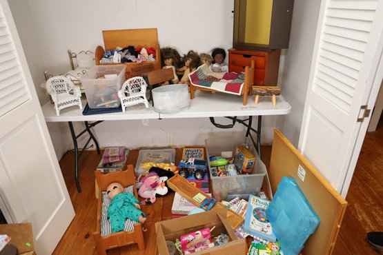 LOT 382 - DOLLS (AMERICAN GIRL DOLLS?) AND OTHER TOYS - ALL CONTENTS OF CLOSET EXCEPET TABLE)