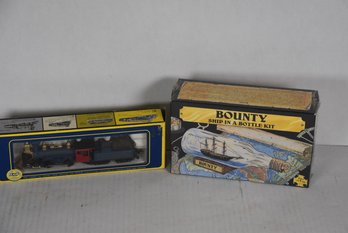 LOT 58 - SHIP IN A BOTTLE / TRAIN