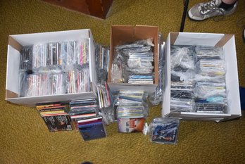 LOT 78 - ASSORTED COLLECTION OF CD'S AND CASES, IN BOXES! UNSEARCHED LOT