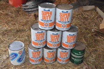 LOT 104 - VINTAGE GULF MOTOR OIL CANS, (AND OTHER CANS) MOST ARE FULL!