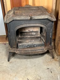 363 - CAST WOOD STOVE, AS SHOWN, GROUND LEVEL