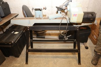 LOT 205 - DELTA WOOD LATHE 12' MODEL 46-700 (SEE PHOTO OF STAIRS, ITS IN BASEMENT)