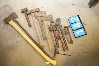 LOT 142 - AXES AND OTHER TOOLS SHOWN