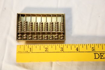 LOT 143 - GOLD COLORED VINTAGE METAL ABACUS