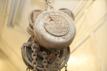 LOT 217 - YALE HOIST - CURRENTLY HANGING, BUYER TO REMOVE, CAN PACK TRUCK BED UP TO IT!