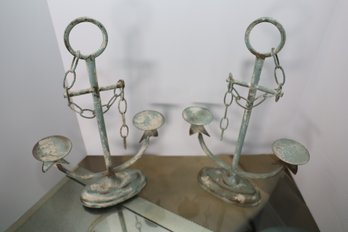 LOT 71 - TWO METAL SHIP ANCHOR CANDLE HOLDERS