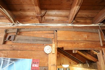 LOT 39 - TWO ANTIQUE SAWS - BUYER TO REMOVE FROM WALL
