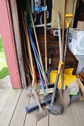 LOT 60 - CORNER LOT OF GARDEN TOOLS, AXES AND MORE