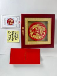 33 - BRADY CHINESE RED AND GOLD DECORATIVE PLATED IN FRAME WITH CERT OF GOLD CONTENT