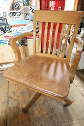 LOT 77 - VINTAGE WOODEN EXECUTIVE CHAIR ON WHEELS