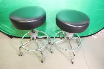 LOT 214 - PAIR OF ROLLING STOOLS