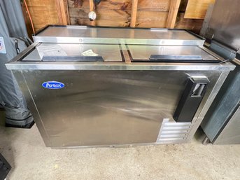 104 - COMMERCIAL GRADE HORIZONTAL BOTTLE COOLER, WORKS GREAT, GROUND LEVEL FOR EASY REMOVAL!