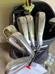 211 - MANY GOLD CLUBS AND BAG