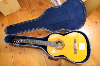 LOT 378 - GUITAR AND CASE