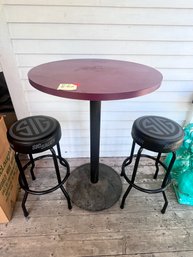 21 - TWO SIG STOOLS AND BAR HEIGHT TABLE