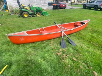 391 - CANOE , ABOUT 16' , WITH PADDLES