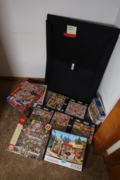 LOT 225 - PUZZLES, AND PUZZLE CARRIER