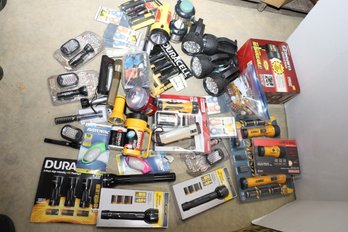 LOT 22 -  HUGE LOT OF FLASHLIGHTS AND LIGHTING - MOSTLY NEW!
