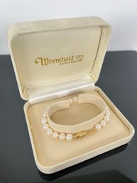 LOT 40 - 14k GOLD AND PEARL BRACELET