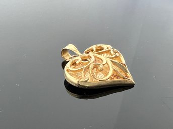 LOT 57 - 14k GOLD HEART PENDANT