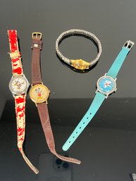 LOT 143 - VINTAGE WALT DISNEY / SNOOPY WATCHES (1950'S)